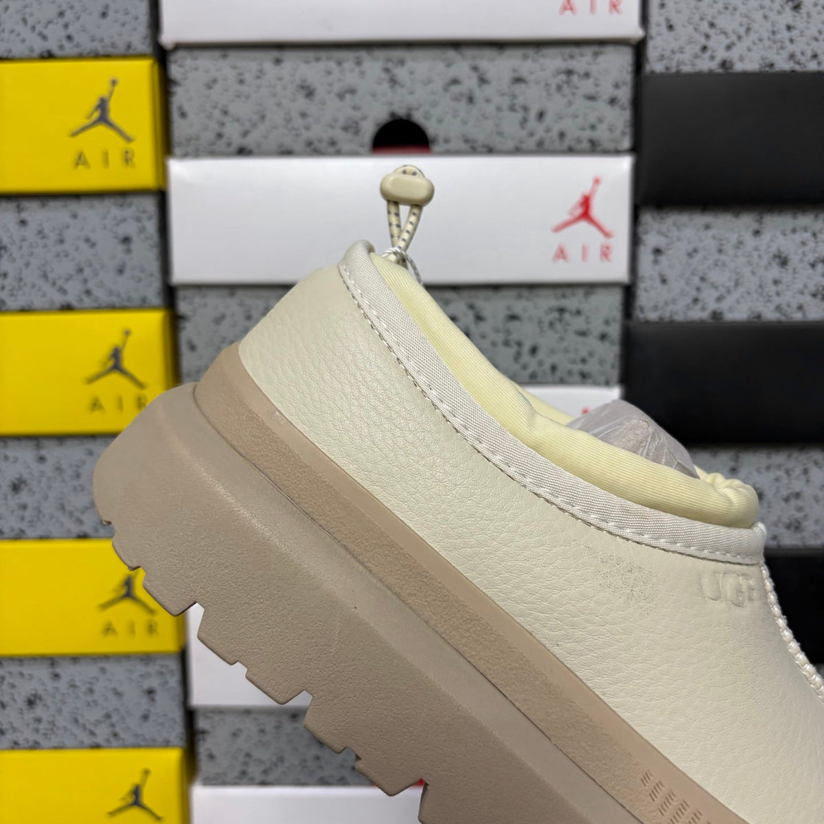 UGG Neumeel Deco Slip-On – Leather Moccasin Sneaker with Cream Lug Sole & Rope Drawstring in Cream